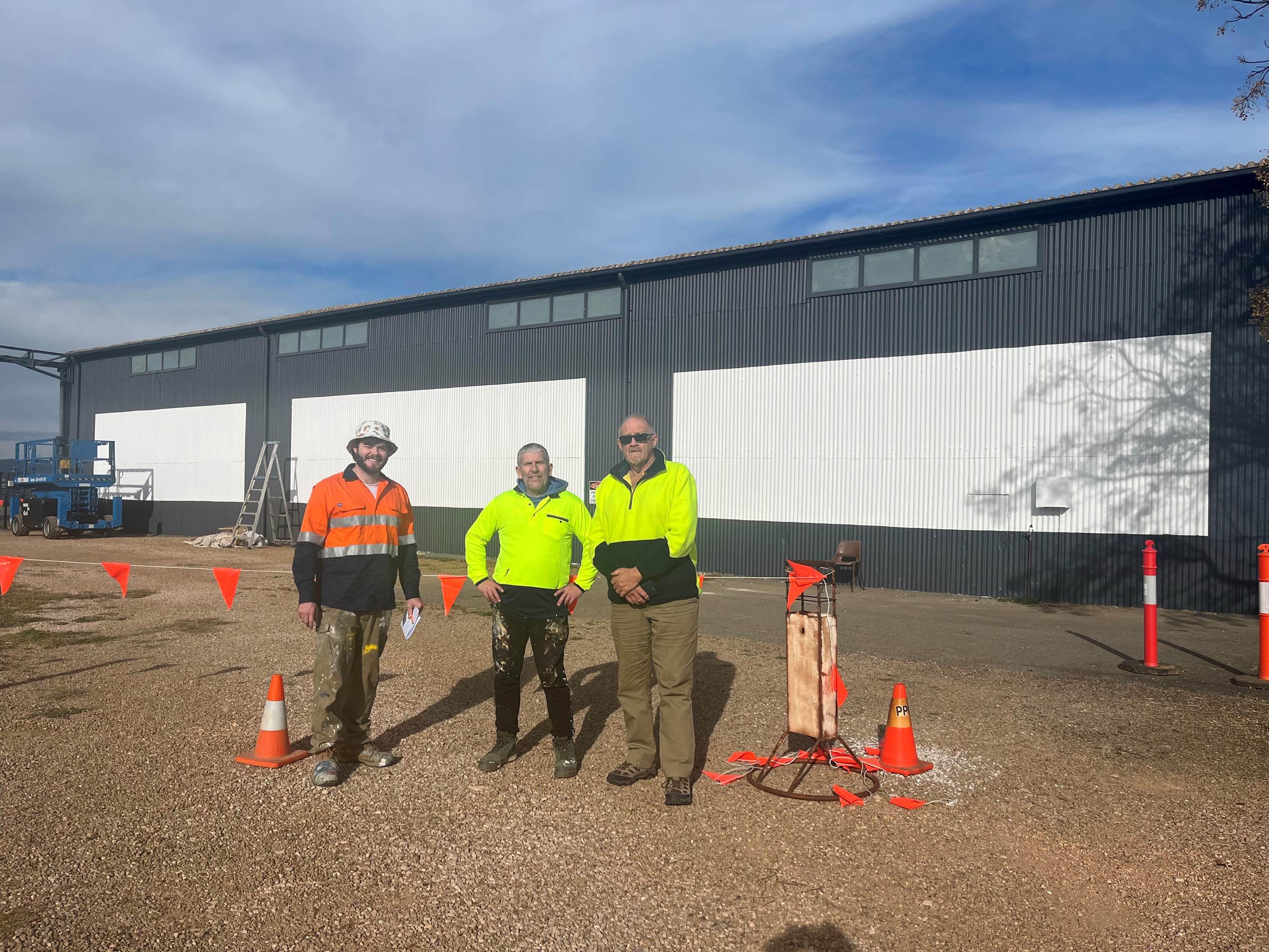 artist and assistant with aerodrome manager
