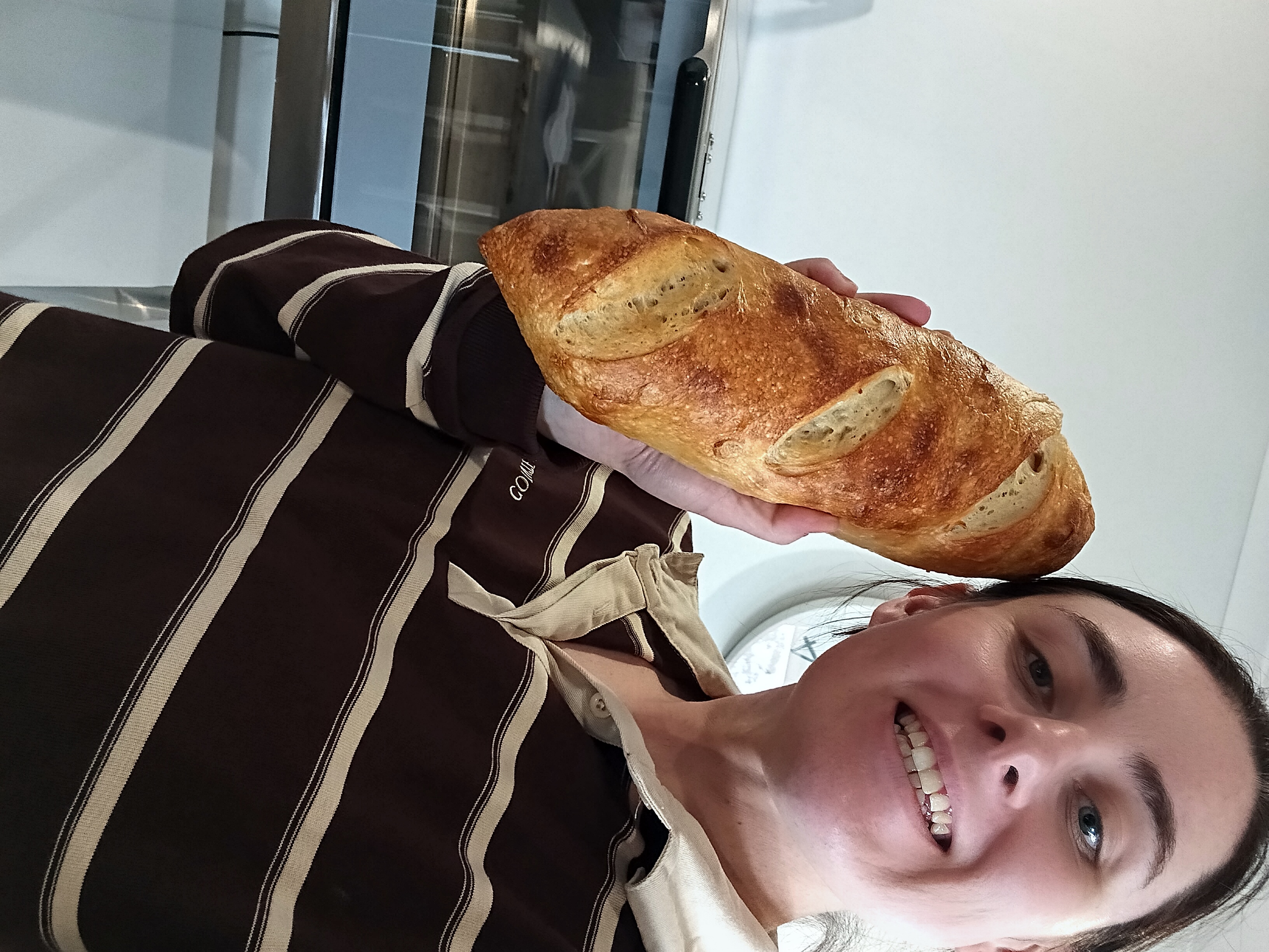 georgina dixon with a loaf of sourdough bread